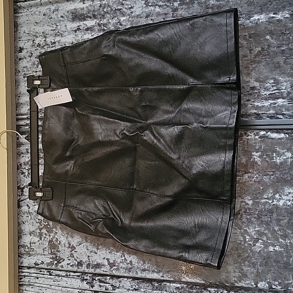 Faux leather Top Shop mini skirt with small front slit. Size 10